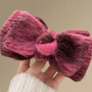 Plush knitted bow hair claw clip in rose red and purple colors for casual daily styling