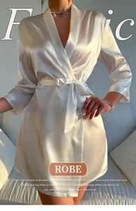 Detail of elegant white satin robe for women with V-neck design and matching silk waist tie