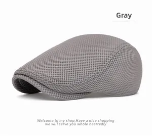 Close-up of gray mesh flat cap showing breathable texture and side profile detail