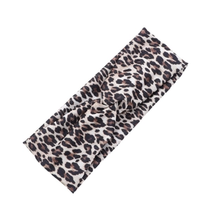 Elastic leopard print headband with twist knot design for yoga and sports wear