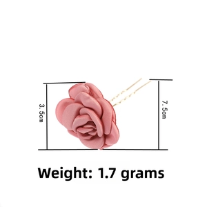 Detail of pink satin rose hair pin showing 3.5cm flower width and 7.5cm U-shaped metal fork