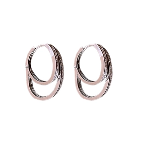 Minimalist silver double hoop earrings with cubic zirconia pavé inlay on white background