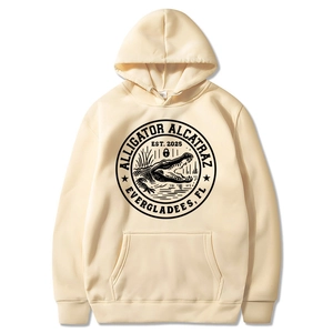 Vintage beige hoodie featuring black and white Alligator Alcatraz circular graphic print
