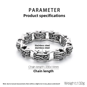 Detail of stainless steel punk chain bracelet featuring intricate scroll carvings and 230mm length