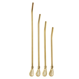 Set of 4 golden stainless steel Yerba Mate straw spoons with integrated filters on white background