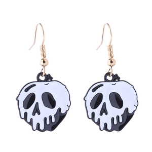 Detail view of skull enamel drop earrings with gold hooks for Halloween costumes