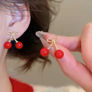 Elegant cherry drop earrings with golden bow design and red resin beads for women