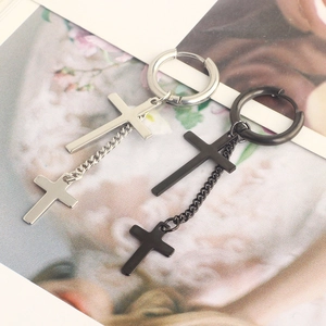 Detail view of black and silver stainless steel cross earrings with hanging chains