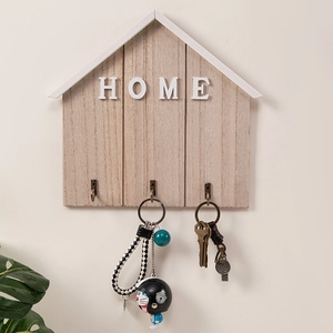 Nordic house-shaped wooden key holder with white HOME letters and three metal hooks