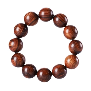 Argentine Green Sandalwood beads bracelet featuring 12 polished natural wood grain beads