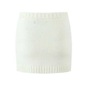 Detail of white knit midi skirt showing high waist elastic and ribbed hem texture