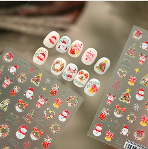 Detail of TS4199 watercolor Christmas nail stickers featuring reindeer and snowmen motifs