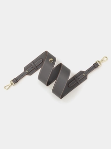 Dark gray leather replacement handbag strap with gold buckles on light gray background