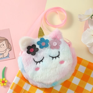 Detail view of plush unicorn crossbody bag for girls with soft multi-color faux fur