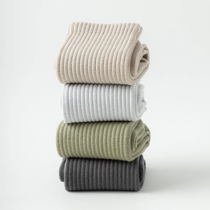 Non-slip yoga socks in ribbed cotton blend featuring beige grey and olive colors