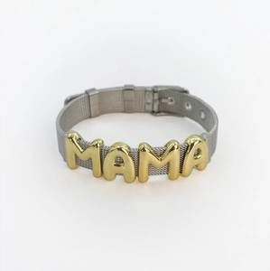 Detail of adjustable silver mesh bracelet with golden MAMA letters and buckle closure