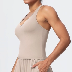 Side view of beige V-neck sports bra with seamless high-elastic fabric for yoga