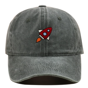 Close-up of a small red rocket embroidery on a vintage washed grey cotton baseball cap