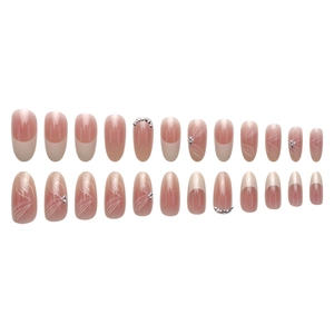 French nude almond press-on nails with white ribbon art and pearl accents 24pcs set