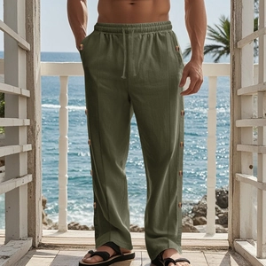 Men's linen casual trousers in olive green featuring drawstring waist and side button details