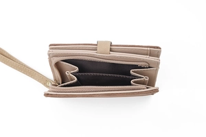 Detail view of the beige women's bifold wallet with multi-card slots and zippered coin pouch