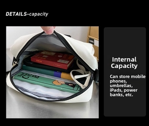 Detail view of white crossbody bag interior showing spacious main compartment storage