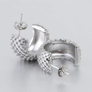 304 stainless steel C-shaped hoop earrings with textured dotted pattern in silver finish