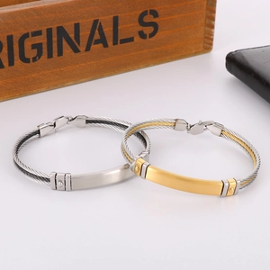 Minimalist woven stainless steel cable bracelets for men in bicolor gold and silver finishes