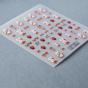Detailed 5D embossed nail stickers featuring retro rabbits, roses and strawberry motifs
