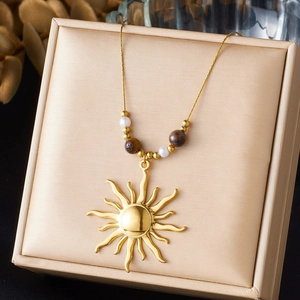 Bohemian gold stainless steel necklace with sun pendant, tiger eye and pearl beads