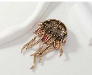 Macro view of the back structure and pin buckle of the rhinestone jellyfish brooch