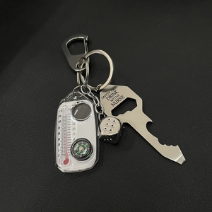 Multi-functional metal keychain with compass, thermometer, dice, and bottle opener tool