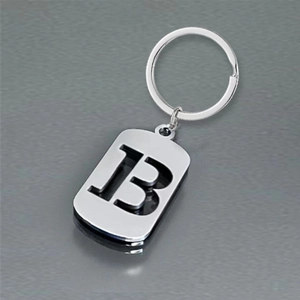 Polished silver stainless steel hollow letter B keychain with reflective surface detail