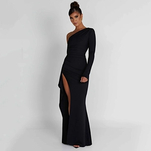Detail of elegant black one-shoulder long sleeve dress with a high side slit and open back
