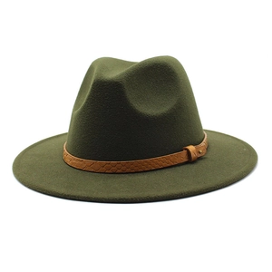 Detail of dark green wool fedora hat with brown crocodile pattern leather band and buckle