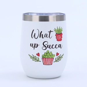 Detail of 12oz white egg-shaped tumbler with succulent print and transparent lid