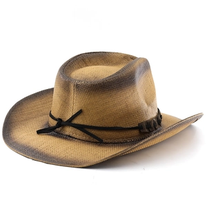 Detail of western straw hat featuring vintage gradient burnt edges and leather cord