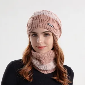 Warm winter knitted beanie and scarf set for women with striped pattern and logo
