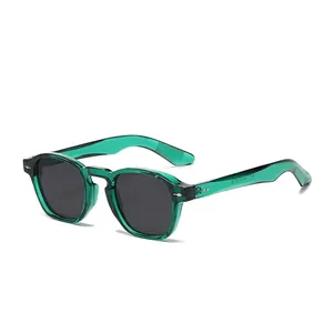 Classic round emerald green translucent sunglasses with dark lenses and metal rivets