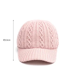 Pink chunky knit baseball cap for women with a 13cm deep fit and warm cable-knit texture