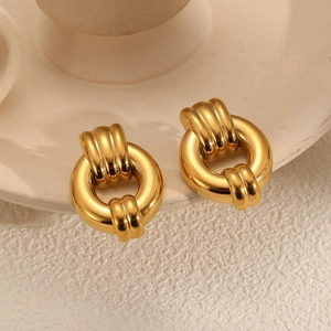 Golden chunky geometric hoop earrings with polished texture in vintage 18k gold style
