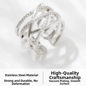 Macro shot of silver multilayer crisscross stainless steel ring with micro zircons