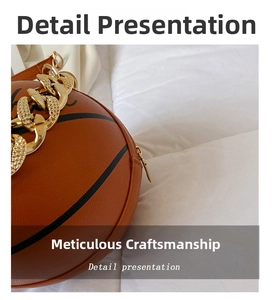 Close-up of creative basketball shaped bag with textured leather and gold chain strap