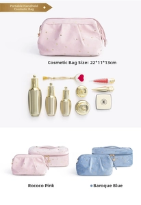 Detail view of velvet cosmetic bags with gold star patterns and a star-shaped metal zipper