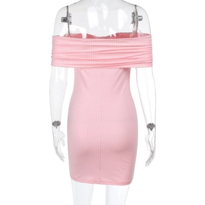 Detail of pink off-shoulder slim fit dress back view with textured fabric on mannequin