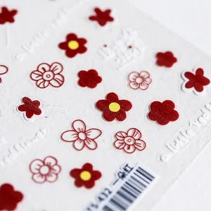 5D embossed red flower nail art stickers with textured floral patterns and matte finish