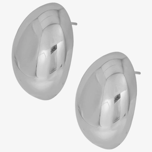 Macro detail of silver polished stainless steel teardrop studs with mirror finish