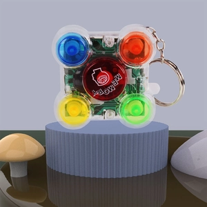 Mini transparent electronic memory game keychain with five colorful buttons on a blue stand