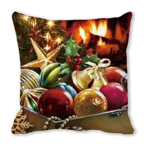 Close-up of festive Christmas pillowcase with fireplace and ornament print detail