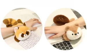 Detail of plush animal wrist rest with non-slip base for office keyboard and mouse support